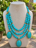 Ferozi necklace with brass Ferozi pendants.
