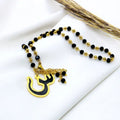 A letter-adorned necklace embellished with crystals