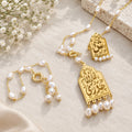 A gold-plated name necklace.
