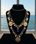 Stainless steel necklace adorned with names and accents of agate.