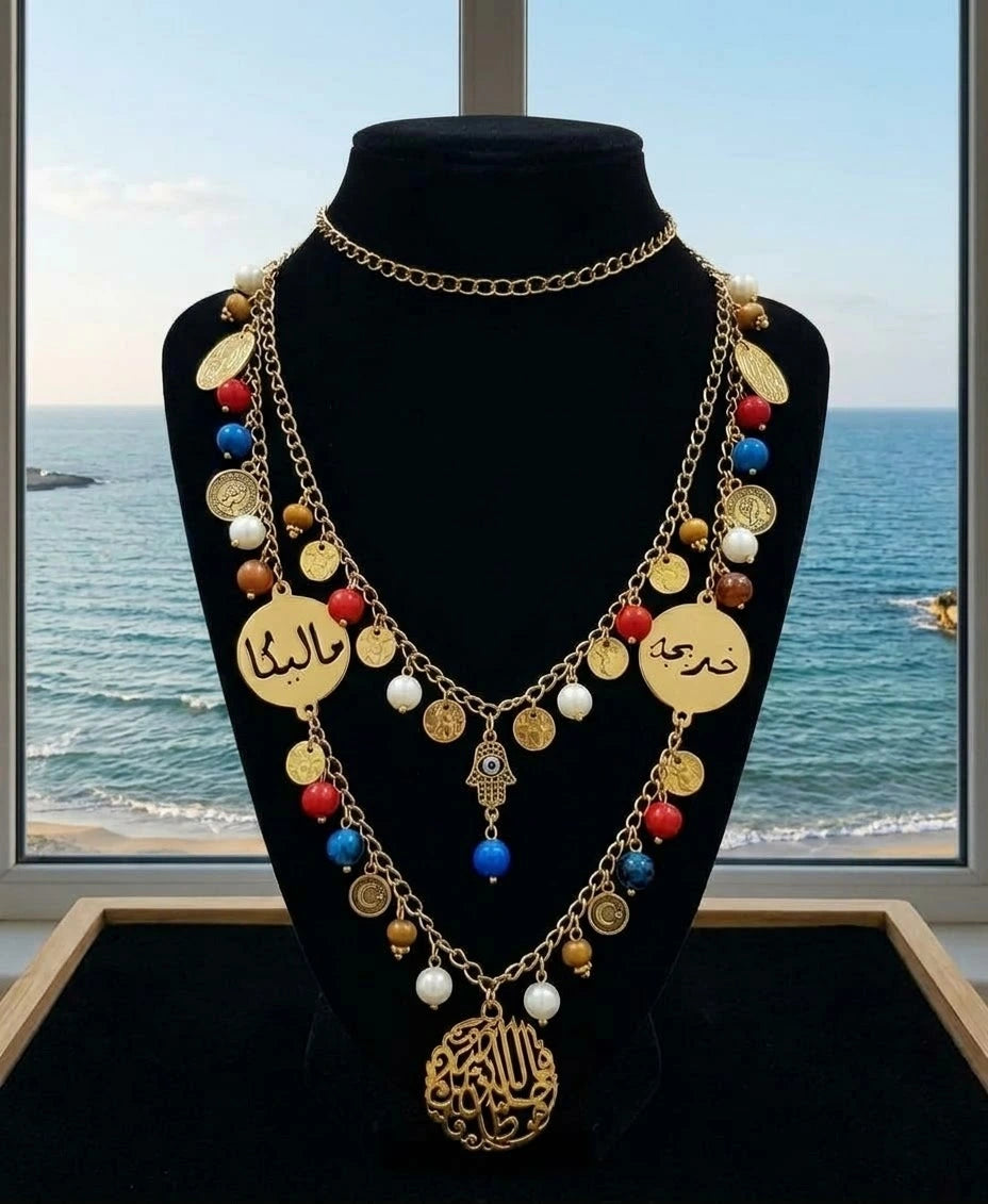 Stainless steel necklace adorned with names and accents of agate.
