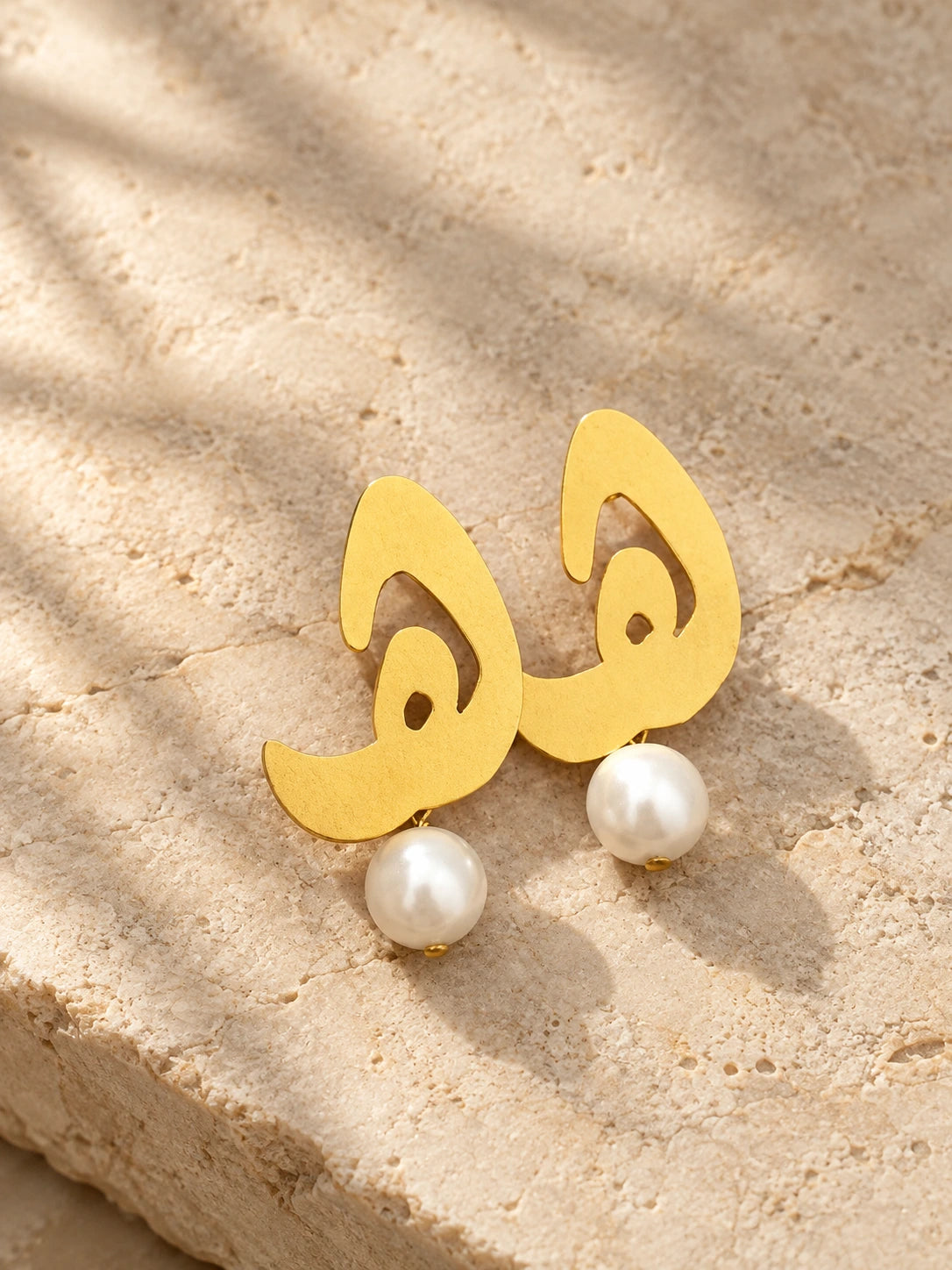 Letter-shaped brass earrings