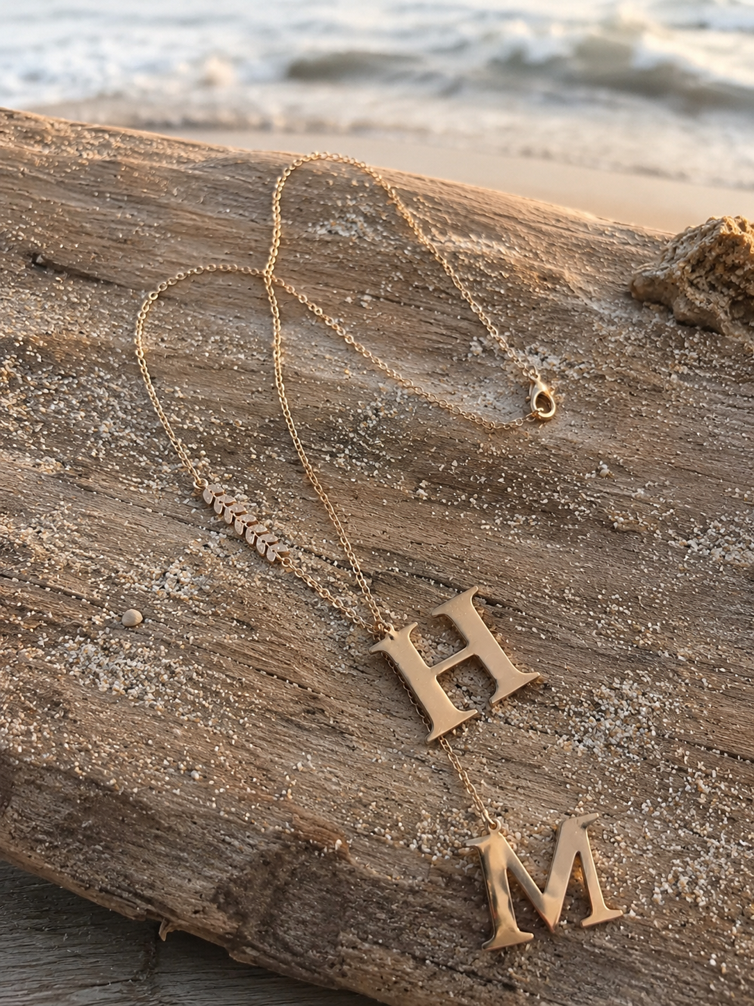 Stainless steel chain with brass letters