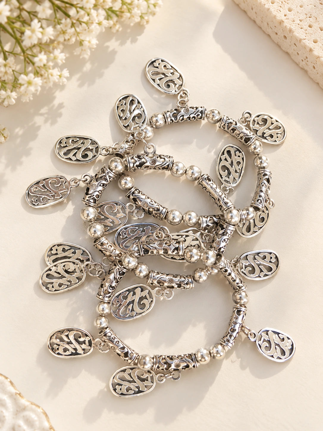 Nickel-chrome bangle, one-size-fits-all.